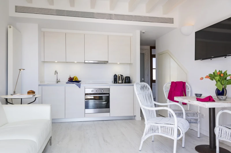 The open kitchen and dining area of the penthouse