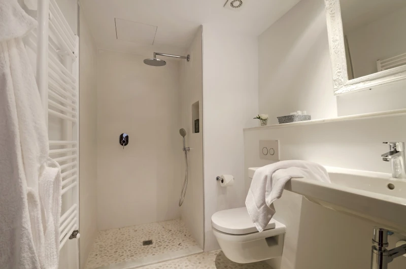 A bathroom in a two bedroom apartment